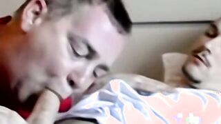 Chubby man receives cum in mouth in interracial threesome