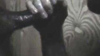 Black Hunk Sucks Big Cock Through Glory Hole