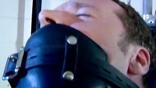 Hunky man Derek Pain is restrained to be tormented on his nipples
