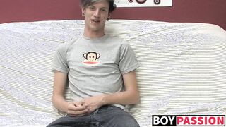 Adorable gay guy Danny jerks off his dick on couch solo