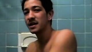 Amateur tattooed twink with a tan showers in classics porn