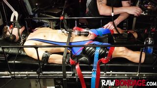 Dungeon master punishes jock in gas mask and cock pumping