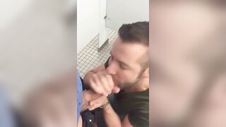 Hunk gives blowjob in a public restroom - amateur gay porn
