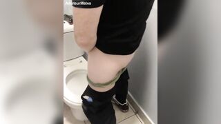 guy opens cubicle and catch his pal urinating (in a pub's public toilets)