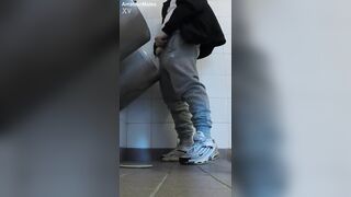 Amateur folks in sneakers jack and attempt hj in public toilets' urinal