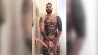 Tatted Hunk Fucks Dildo in Shower Until He Cums687